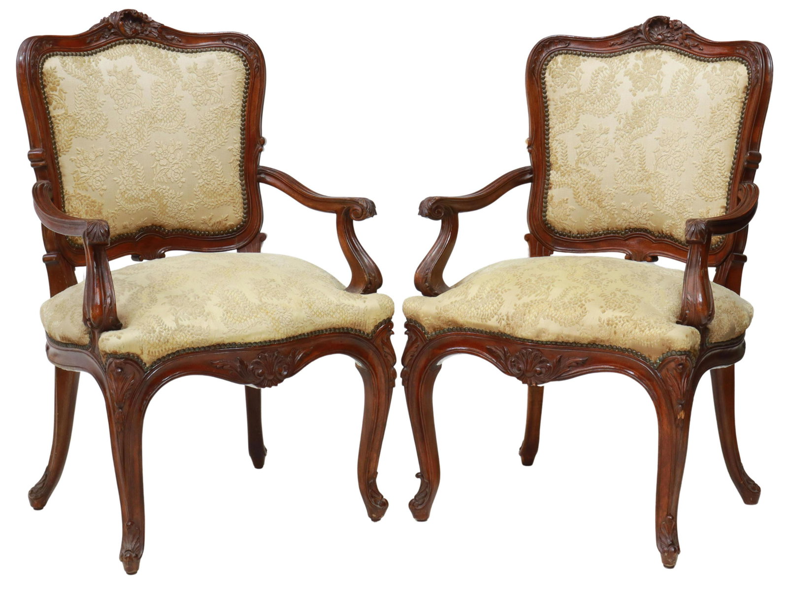 (2) SPANISH LOUIS XV STYLE MAHOGANY ARMCHAIRS: (lot of 2) Louis XV style mahogany armchairs, Spain, 20th c., having carved shell crest, over damask upholstered back and seat, with nailhead trim, scrolled acanthus handholds, rising on cabriole legs
