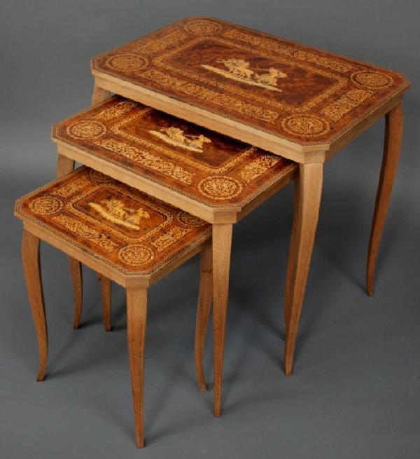 ITALIAN MARQUETRY INLAID NEST OF TABLES: (lot of 3) Italian marquetry nest of tables, 20th c., rectangular tops on flared legs, each foliate inlaid and having a central scene of a Roman figure driving a horse pulled chariot, putti play at ea
