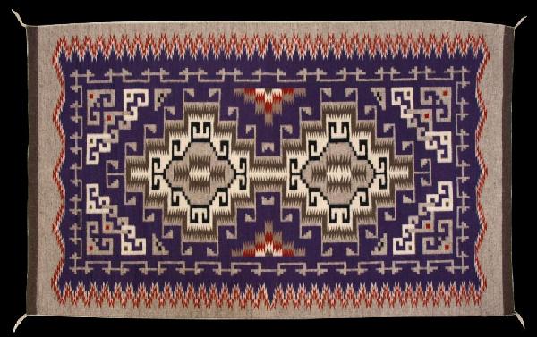 NAVAJO INDIAN RUG, MARIE BEGAY, WEAVING PHOTOS: Finely woven American Indian Navajo wool rug, Burnham pattern by Marie Begay (New Mexico), 1996, with certificate of purchase from Cristof's, Santa Fe, together with three photos of Marie Begay weavin