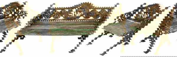 ORNATE CAST IRON COLONIAL RAILWAY STATION BENCHES: (lot of 3) Cast iron garden furniture with slatted wood seats, the suite showing remnants of a painted finish, comprising (1) long garden bench, 30"h, 49"w, 25"d, and (2) companion chairs, each having