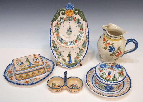 HENRIOT QUIMPER PITCHER, CADDY & DISHES: (lot of 5) Henriot Quimper table accessories including: (1) jug, image of man with floral motif, 6.5"h; (1) dual condiment caddy, minor chip to edge, restoration to handle, 5.5"w; (1) footed spoon res