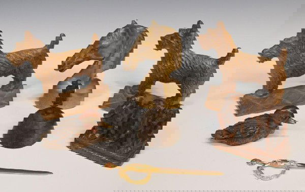 LOT: VERONA DOG BOOKENDS, ERTE LETTER OPENER: (lot of 7) Metal desk items including: (pair) Verona Scottie dog cast iron book ends, 5.25"h; (1) Erte 'Fireflies' letter opener, 6.5"h; (1) bronze duck paperweight, signed 'G&D', 4.5"l; (1) antique m