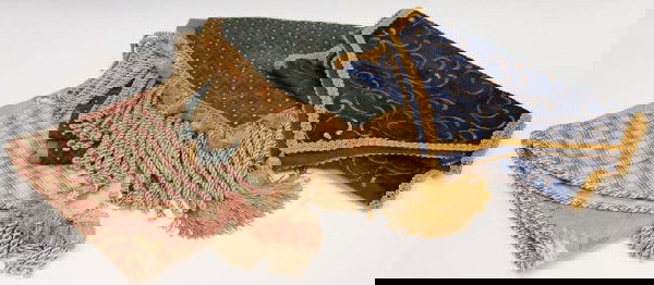 LOT OF (3) TEXTILE DECORATIVE TABLE RUNNERS: (lot of 3) Collection of textile table runners including:(1) spring colored green and pink runner with floral pattern, retaining original retail tag, 68"l, 16"w; (1) blue velvet and gold swirl runner,