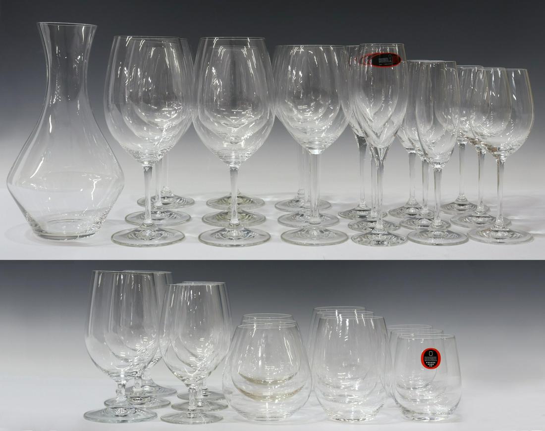 (34) RIEDEL COLORLESS GLASS STEMS & TUMBLERS: (lot of 34) Riedel colorless glass wine stems and tumblers, all having acid-etched mark underfoot, comprising: (1) "Magnum" decanter, in original box, approx 11"h; (3) "Vinum XL" Cabernet stems, appro