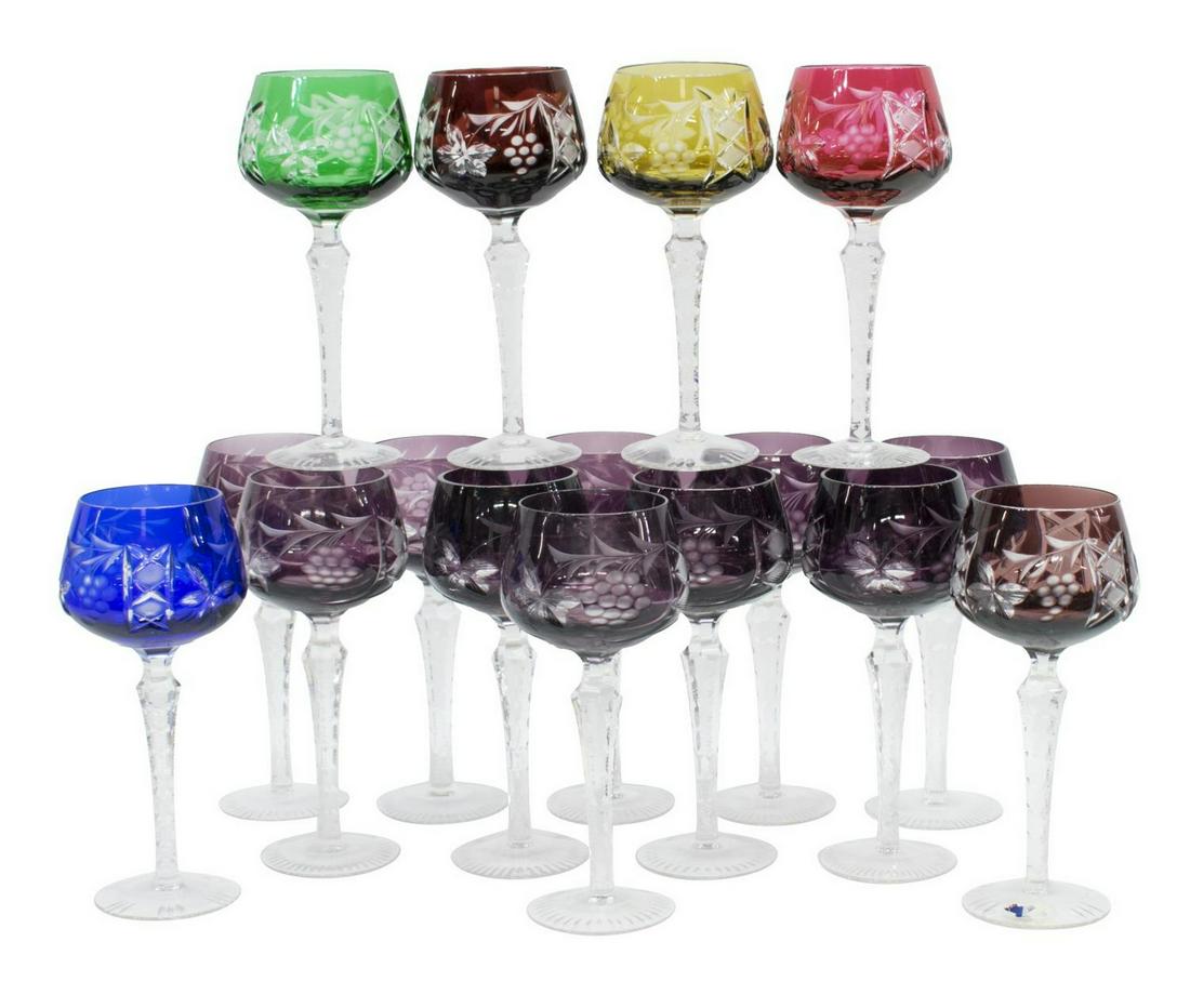 (16) ASSORTED BOHEMIAN CUT TO CLEAR WINE GLASSES: (lot of 16) Bohemian cut-to-clear matched assorted color wine glasses, each with grape motif to bowl, comprising: (10) purple glasses; (1) cranberry glass; (2) ruby glasses; (1) green glass; (1) cobal