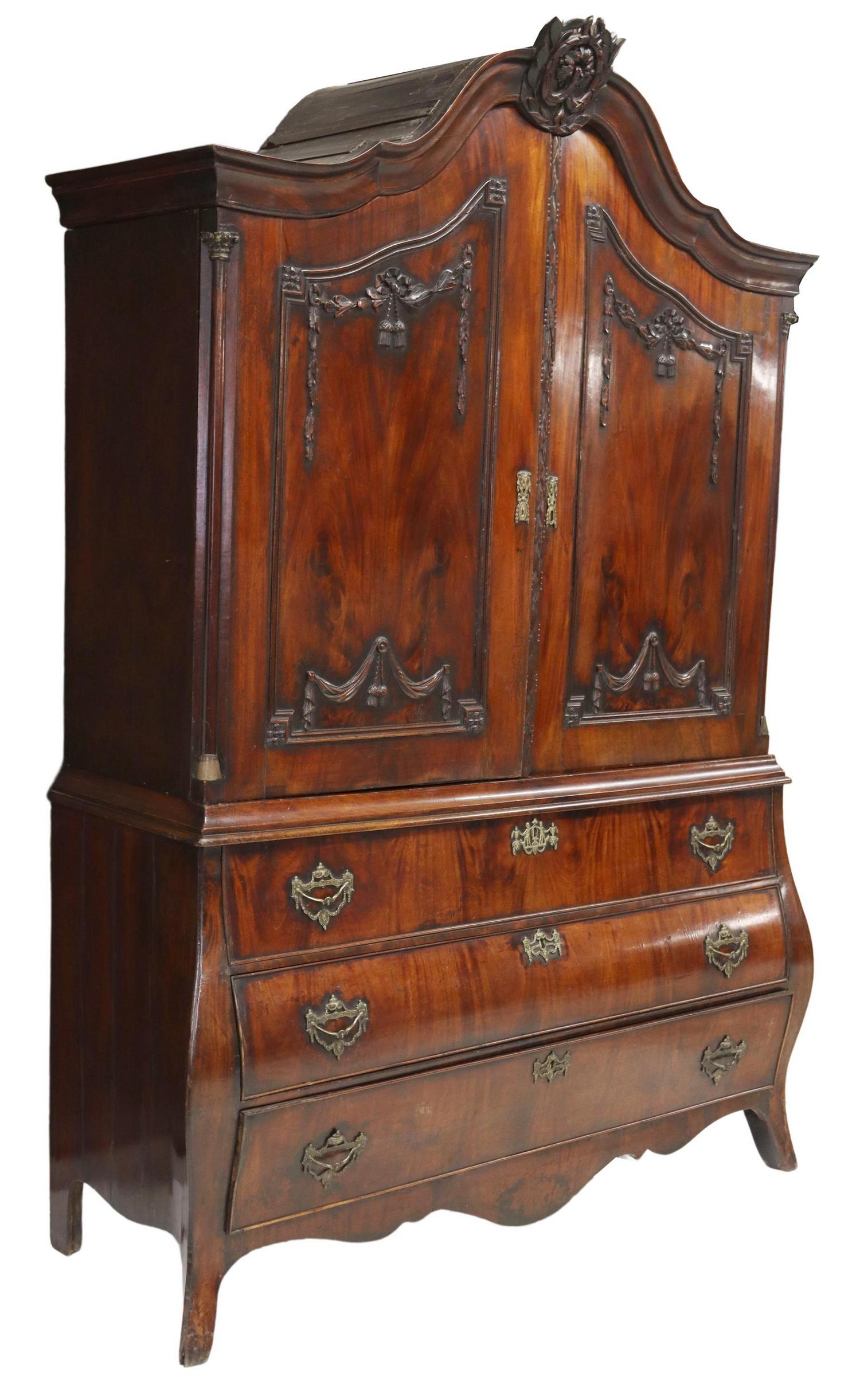 DUTCH NEOCLASSICAL MAHOGANY LINEN PRESS ARMOIRE: Dutch Neoclassical mahogany linen press/ armoire, 19th c., carved crest, double doors with carved tassels and garlands, interior shelf, lower case fitted with three drawers, rising on French bracket f