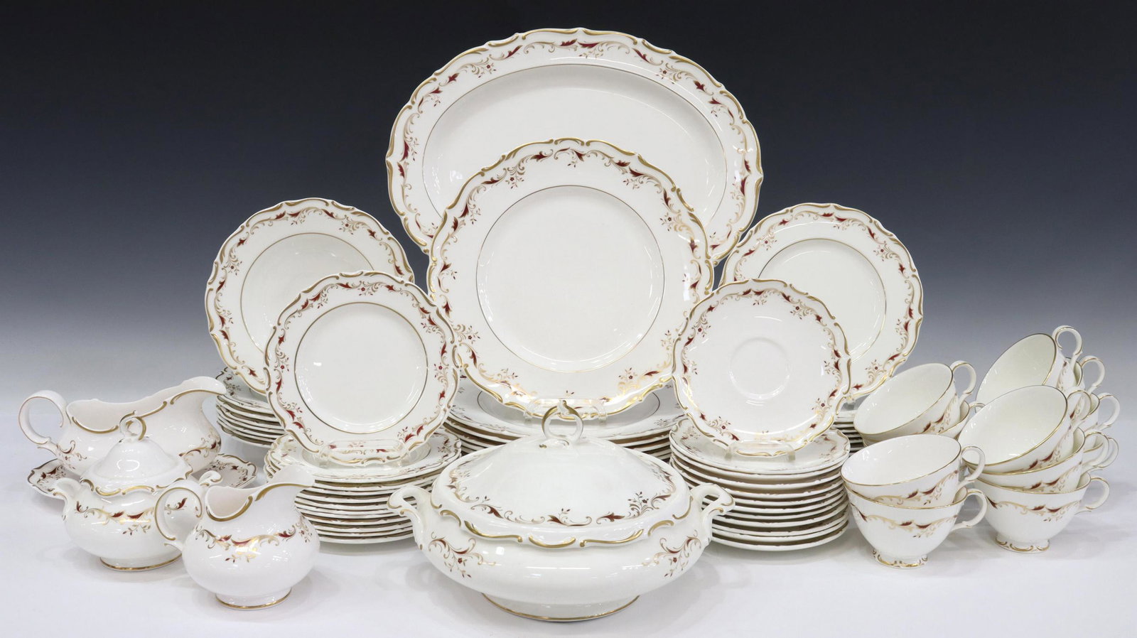 (72) ROYAL DOULTON 'STRASBOURG' DINNER SERVICE: (lot of 72) English bone china dinner service, Royal Doulton, in the "Strasbourg" pattern, having white ground with maroon and gilt scroll border, including: (11) dinner plates, approx 10.5"diam; (12)