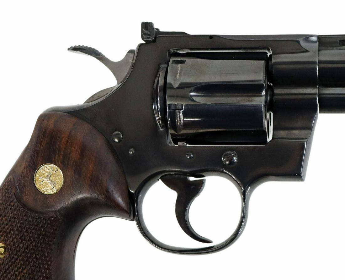 COLT PYTHON .357 DA REVOLVER, 6" BARREL: Colt Python Revolver, mfg. 1974, double action .357 caliber, 6" vent rib barrel, fixed front sight, adjustable rear sight, swing out six round cylinder, Colt logo checkered wood grips, metal 98%, ligh