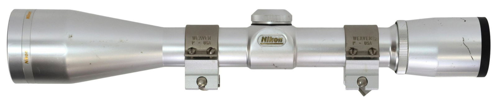 NIKON 4 X 40 RIFLE SCOP, SILVER FINISH: Nikon 4 x 40 rifle scope in silvered finish, optics and reticle seem good, approx. 11.5"l, .85lb Start Price: $80.00