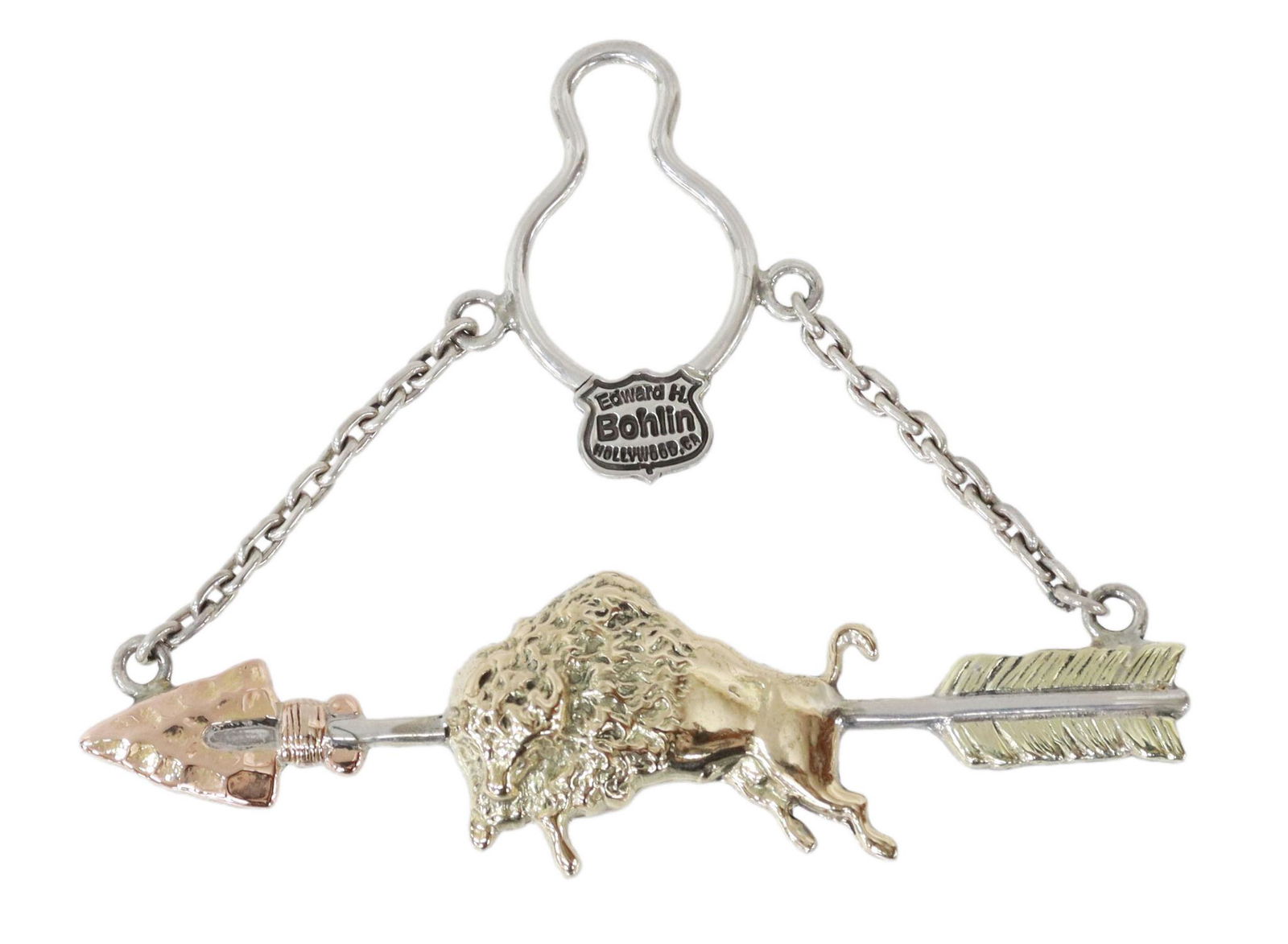 BOHLIN STERLING & 14KT GOLD BISON & ARROW TIE BAR: Western sterling silver and 14kt gold overlay tie bar with chain, Edward H. Bohlin, Hollywood, California, bison design, backing bar modeled as an arrow, overlaid in two-tone gold, approx 2.75"h, 3.5"