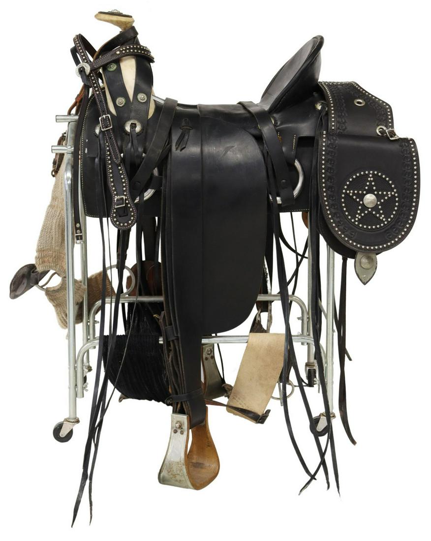 WESTERN BLACK J&C STEWART SADDLE, BAGS, HEADSTALL: Western black leather saddle by J&C Stewart, Show Low, Arizona, 17.1/2" seat, black saddlebags by John Day Tx. Cattle Co. with silver-tone nailheads accents and Mexico eagle conchos. black leather hea