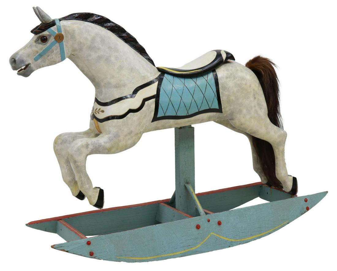 DAPPLE JUMPER TRACK CAROUSEL ROCKING HORSE: American track machine carousel horse, early 20th c., now mounted as a rocking horse, white and gray dapple, inset glass eyes, natural horsehair tail, saddle with carved cantle, blue painted saddle bl