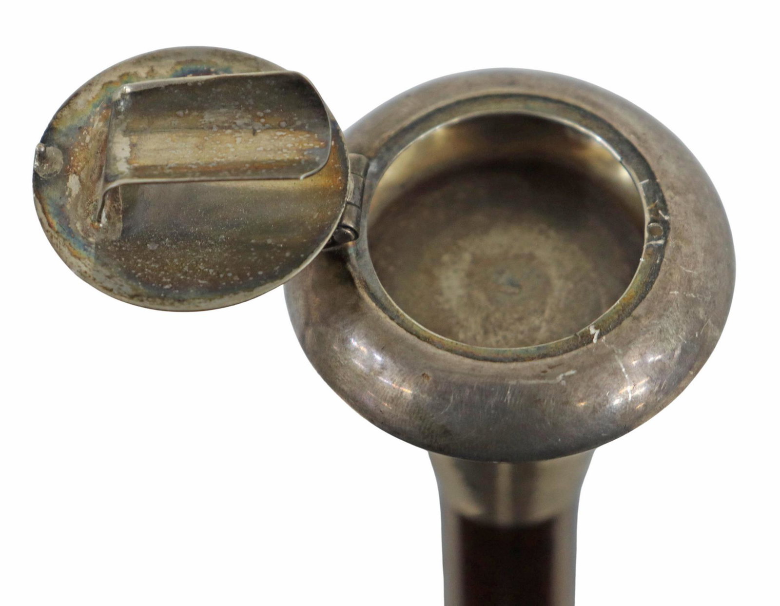 WALKING STICK WITH STERLING ASH TRAY: Sterling hand hold top walking cane, the top opens to an ashtray and cigarette holder, marked .925 at interior, overall: approx. 35.75"l, .55lbs Start Price: $80.00