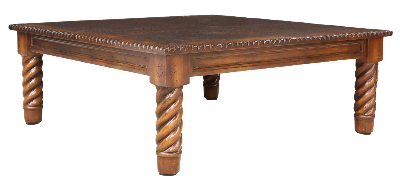 WESTERN STYLE TOOLED LEATHER TOP COFFEE TABLE: Western style coffee table, 20th c., with custom tooled leather top in a foliate pattern, notched edge, rising on spiral legs, approx 18.5"h, 48"w, 48"d Start Price: $150.00