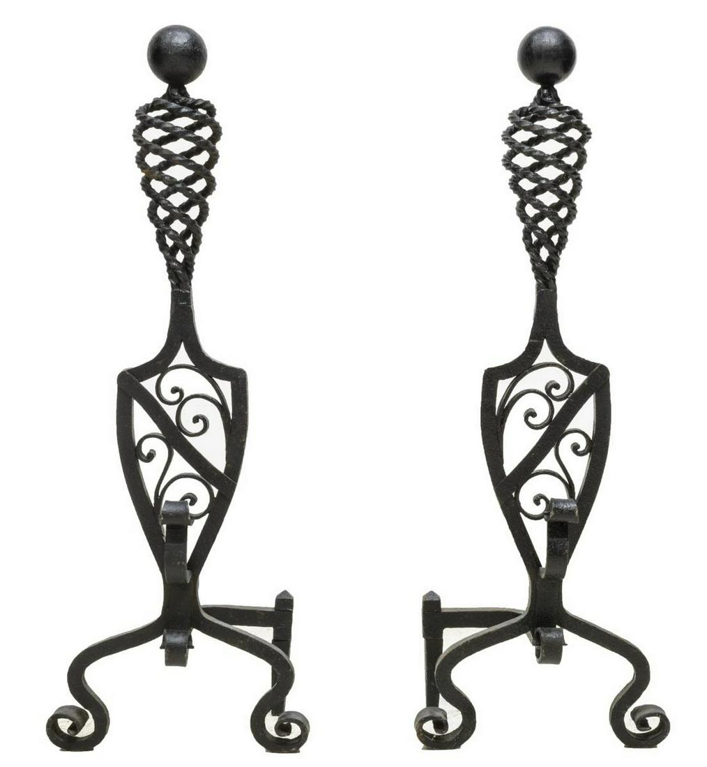 (2) ARTS & CRAFTS SPIRALED WROUGHT IRON ANDIRONS: (pair) Arts and Crafts black wrought iron andirons, early 20th c., each having ball-form finial, over spiraled and vasiform scrollwork standard, on scrolled feet, approx 34"h 12"w, 10"d Start Price: $