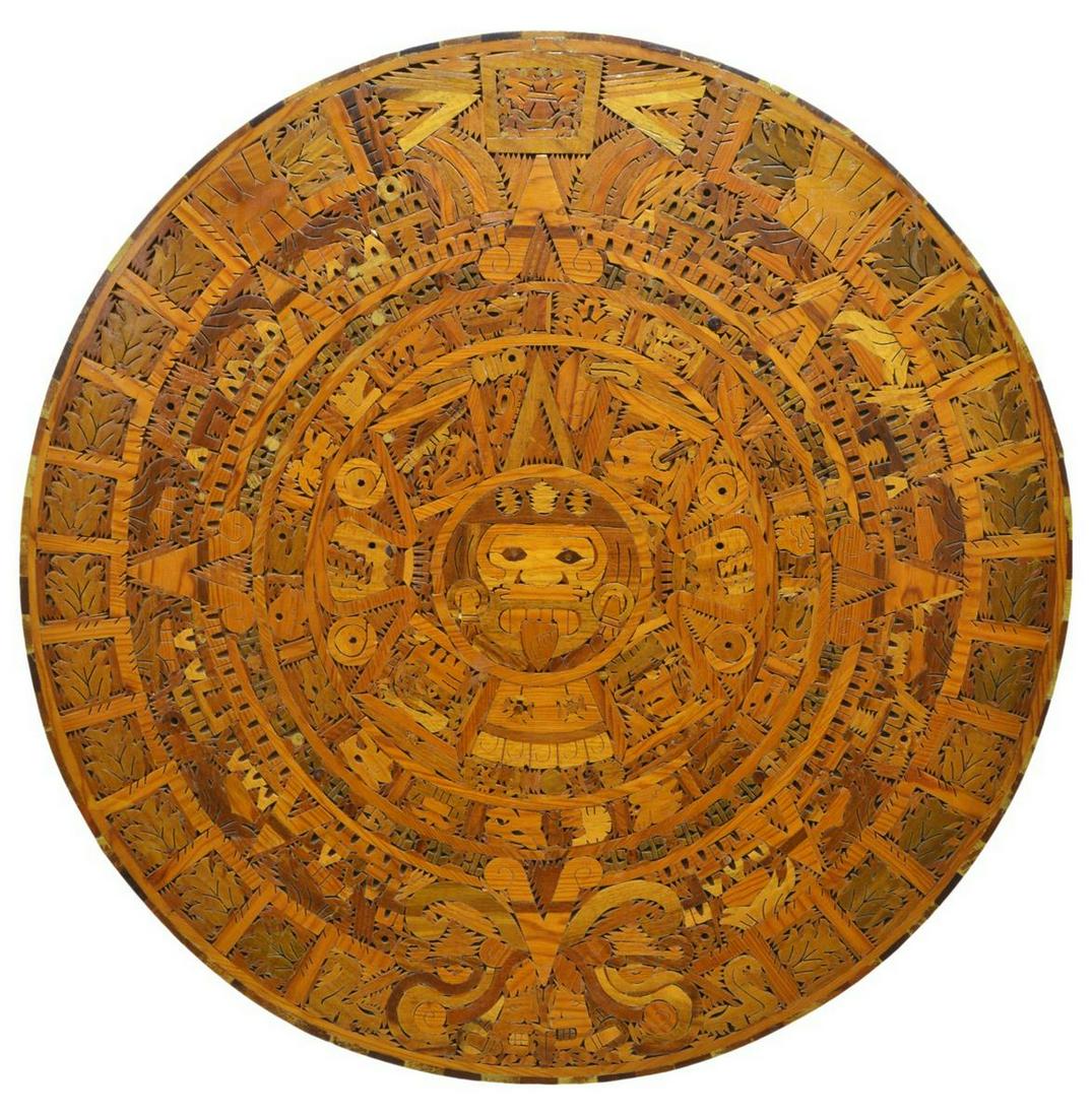 MIXED WOOD MARQUETRY AZTEC SUN CALENDAR: Mixed wood marquetry Aztec sun calendar, Mexico, 20th c., reverse hardware for hanging on the wall, approx 33"diam Start Price: $80.00