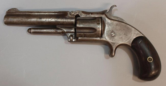 ANTIQUE S&W NO. 1-1/2 SECOND ISSUE REVOLVER: Smith & Wesson No. 1-1/2 Second Issue Revolver, .32 caliber, 5 shot fluted cylinder, 3.5" round barrel marked at top "Smith & Wesson Springfield Mass Pat Apr.2.55. July.5.59& Nov.21.65" rosewood grips