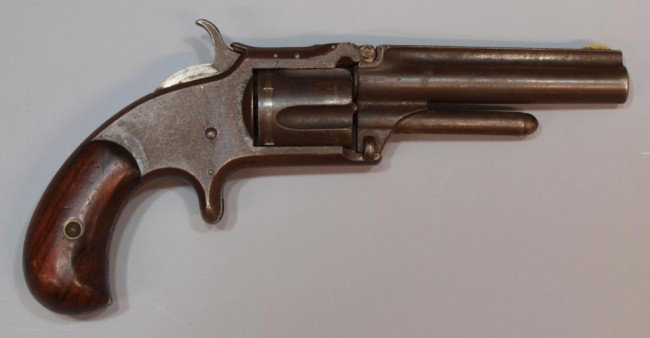ANTIQUE S&W NO. 1-1/2 SECOND ISSUE REVOLVER: Smith & Wesson No. 1-1/2 Second Issue Revolver, .32 caliber, 5 shot fluted cylinder, 3.5" round barrel marked at top "Smith & Wesson Springfield Mass Pat Apr.2.55. July.5.59&Nov.21.65" rosewood grips,