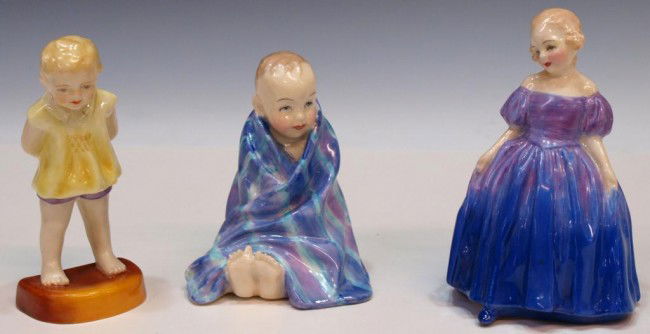 SCARCE ROYAL DOULTON BLUE 'LITTLE PIG' HN 1794: (lot of 3) Porcelain figurines including: (1) scarce Royal Doulton, "This Little Pig", HN1794, boy wrapped in blue and purple blanket, produced 1936-1948, 4"h; (1) Royal Doulton, 'Marie', 1370, girl i