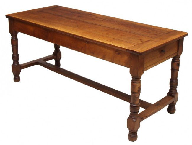 ANTIQUE FRENCH FRUITWOOD FARMHOUSE TABLE: French fruitwood farmhouse table, c. 1900, rectangular plank top, over a plain skirt with drawer at each end, one with pull out tray, turned legs joined by a stretcher, 29"h, 67"l, 27"d Start Price: $