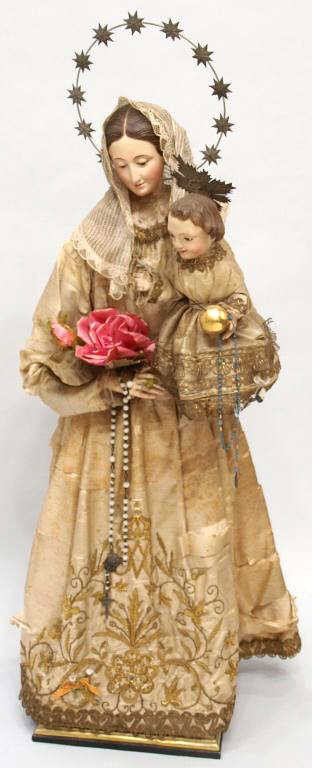ANTIQUE SPAIN CARVED RELIGIOUS FIGURAL GROUP: Northern Spain carved wood statuary group, the Madonna and Christ Child, c. 1860, each polychromed with expressive features and glass eyes, fantastic silk gowns embroidered with heavy silver and gilt 