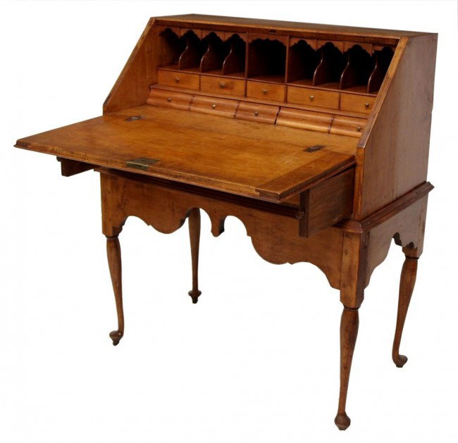 AMERICAN 18TH C. MAPLE DESK, MASSACHUSETTS: American Queen Anne style tiger maple desk, Boston, Massachusetts, late 18th c., having dovetailed joinery at top and sideboards, slant front opening to writing surface and gallery with eight drawers 