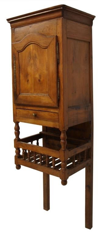 UNUSUAL FRENCH CHERRYWOOD KITCHEN CUPBOARD: French cherrywood kitchen cupboard, early 1800's, the shaped cornice over a brass hinged door and single drawer, the lower section open with spindles and rails, 84"h, 28"w, 20"d Start Price: $500.00