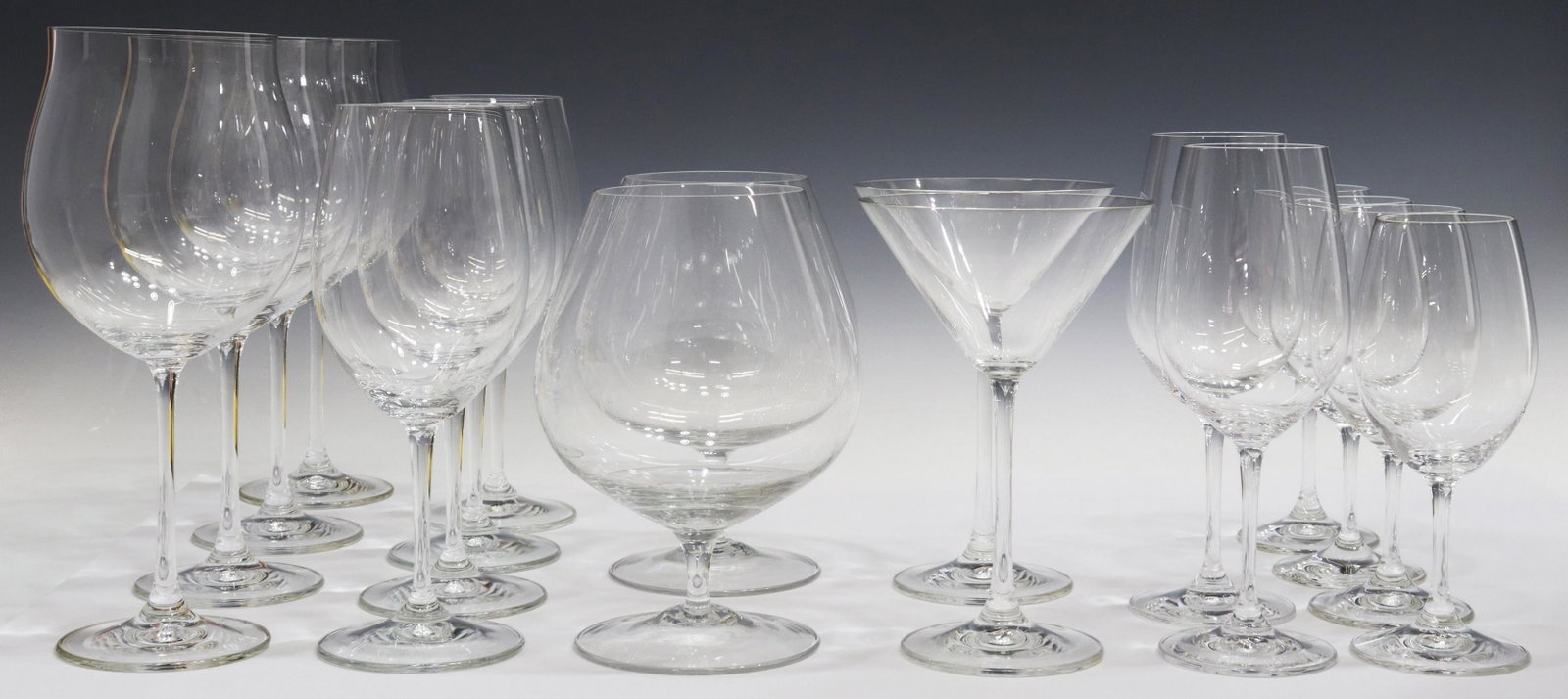 (32) RIEDEL COLORLESS GLASS STEMWARE & TUMBLERS: (lot of 32) Riedel colorless glass stemware, all having acid-etched mark underfoot, including: (6) double old fashioned tumblers, approx 3.75"h, 3.5"diam; (4) white wine stems, approx 7.25"h, 2.25"dia