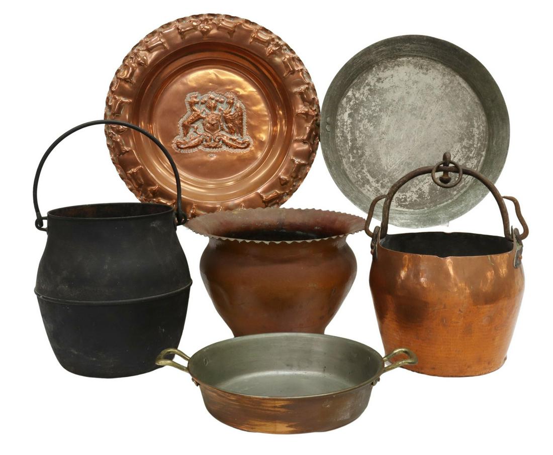 (6) COPPER & OTHER METAL COOKWARE, HOUSEWARES: (lot of 6) Copper and other metal cookware and housewares, including: (1) copper charger, Chile, having central repousse coat of arms and foliates to rim, approx 15.75"diam; (2) cauldrons with bail ha