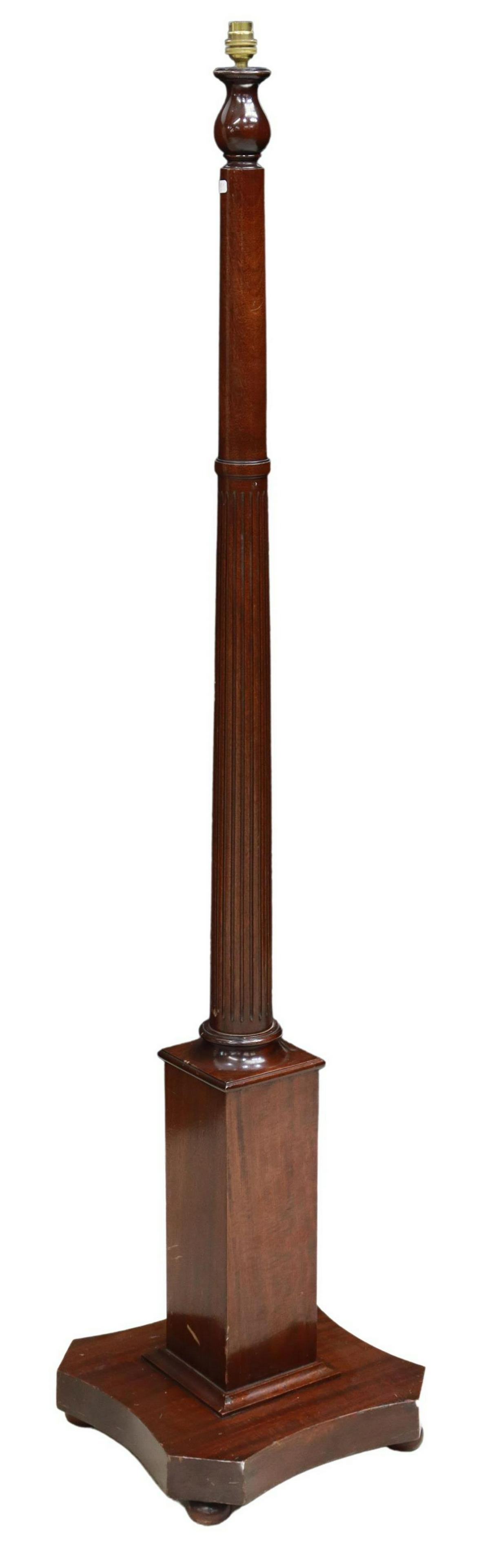 NEOCLASSICAL MAHOGANY SINGLE-LIGHT FLOOR LAMP: Neoclassical mahogany single-light floor lamp, early 20th c., fluted standard, shaped platform base further raised on bun feet, in need of wiring, some surface scratches, approx 61.5"h, 13.75"w, 13.75