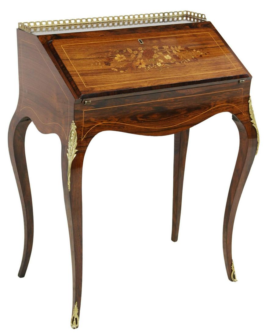 FRENCH LOUIS XV STYLE ROSEWOOD SLANT FRONT DESK: French Louis XV style rosewood lady's writing desk, early 20th c., brass gallery, slant-front panel with floral marquetry, interior with two drawers, compartment behind sliding panel, inset writing su