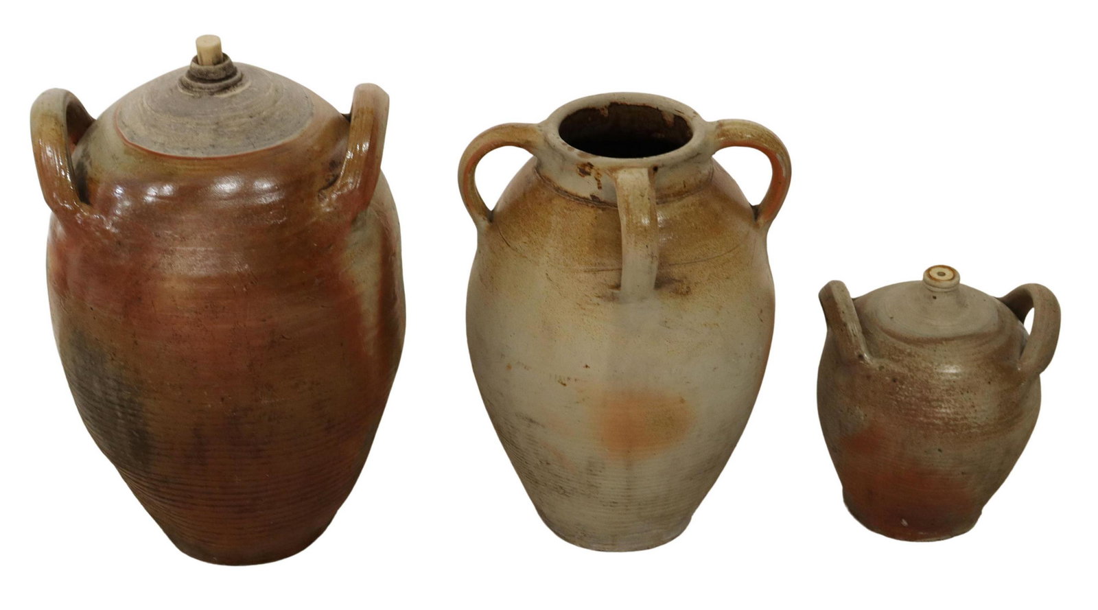 (3) FRENCH PROVINCIAL EARTHENWARE OIL JUGS: (lot of 3) French provincial earthenware oil jugs, partially glazed, including: (1) having wide open mouth, three handles, broken spout; (2) having narrow mouth, and dual handles; some expected chips 