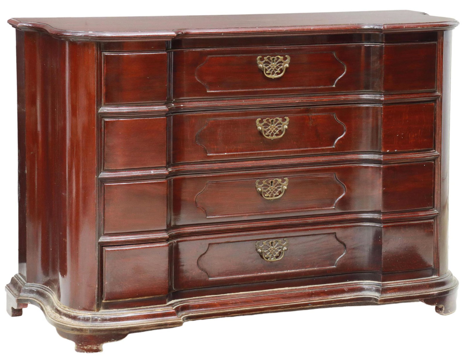 SPANISH MAHOGANY CHEST OF DRAWERS: Mahogany chest of drawers, Spain, 20th c., having shaped top, over four drawers, with openwork batwing escutcheons and bail pulls, rising on bracket feet, approx 32.25"h, 47"w, 17.75"d Start Price: $1