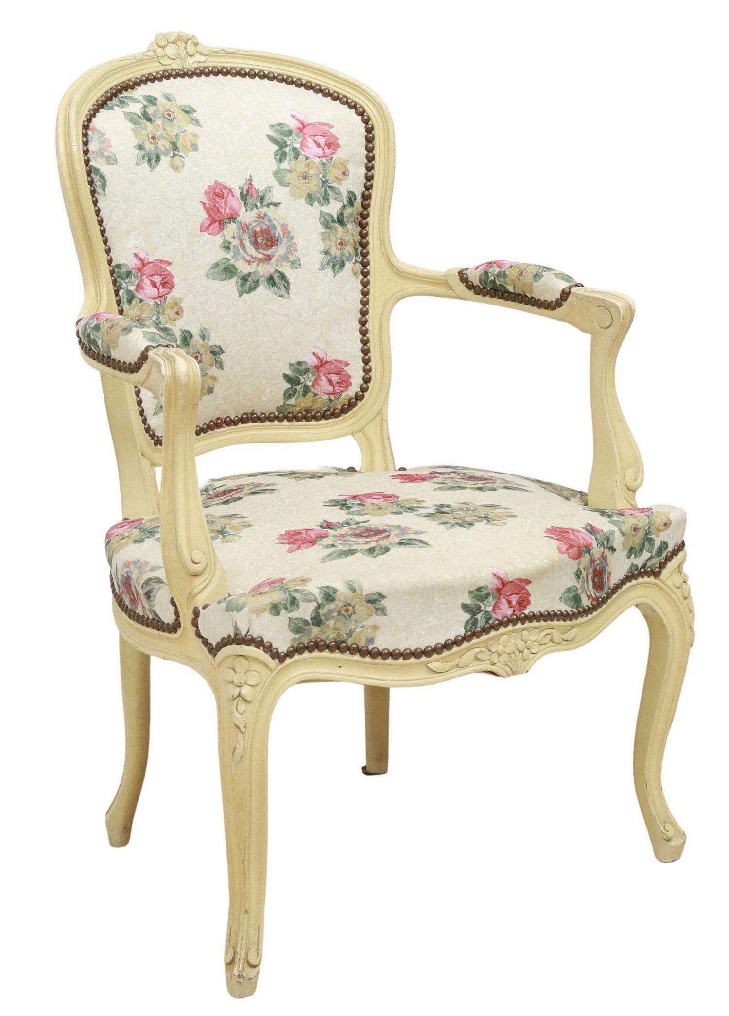 FRENCH LOUIS XV STYLE PAINTED CHINTZ FAUTEUIL: French Louis XV style painted armchair, 20th c., craquelure painted frame, carved floral crest, over chintz upholstered back and seat, with nailhead trim, rising on cabriole legs, approx 34"h, 23.25"w