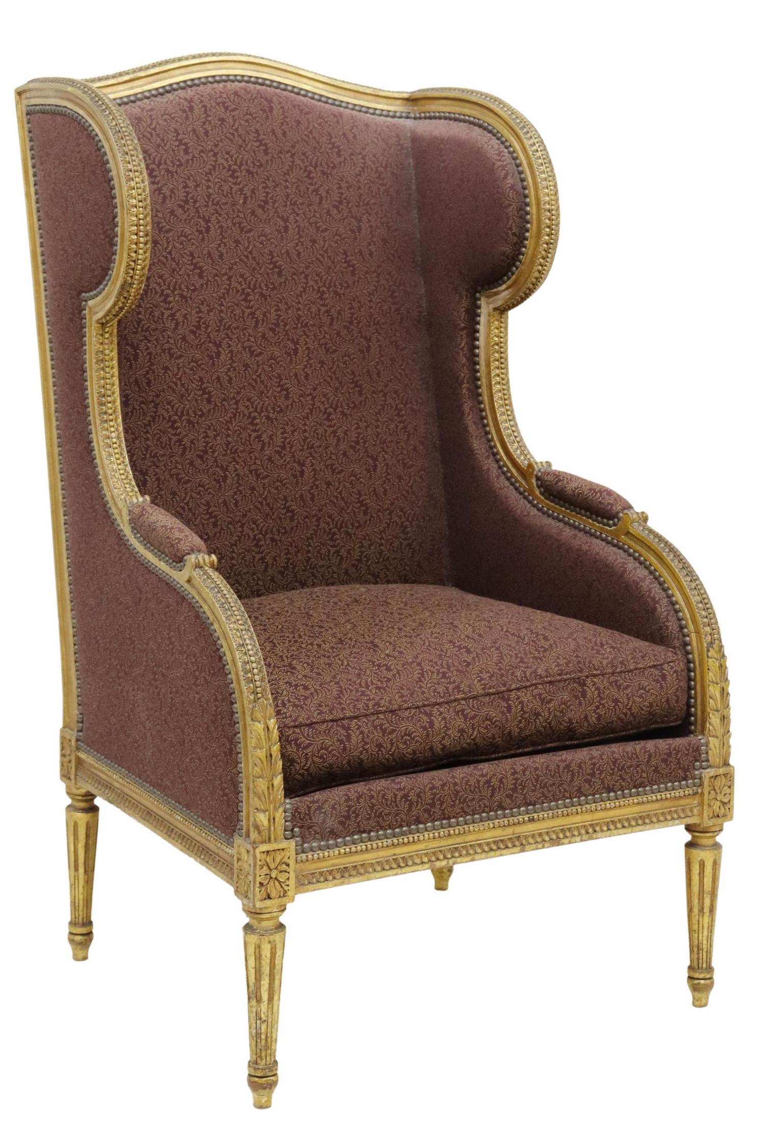 FRENCH LOUIS XVI STYLE GILTWOOD WINGBACK BERGERE: French Louis XVI style wingback armchair, early 20th c., giltwood frame, carved with egg and dart trim, over upholstered back, seat and arms, rising on fluted and tapered legs, approx 47.5"h, 27.5"w, 