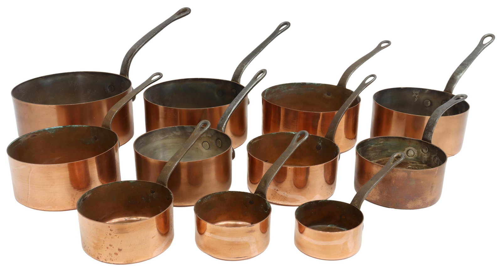 (11) FRENCH COPPER GRADUATED SAUCEPANS: (lot of 11) French copper graduated saucepans, in two sets, all with iron handles, apparently unmarked, largest: approx 8"h, 8"diam, 14.75"w (with handle), 16lbs total Start Price: $200.00