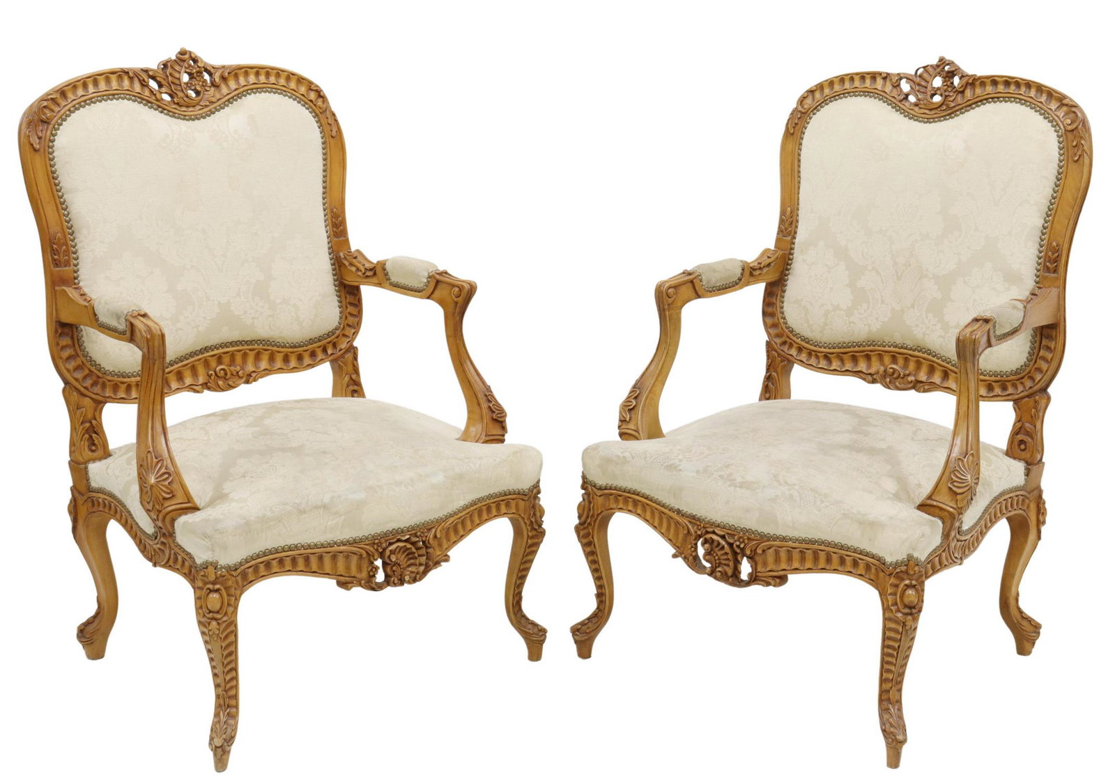 (2) FRENCH LOUIS XV STYLE CARVED FAUTEUILS: (pair) French Louis XV style armchairs, 20th c., carved rocaille crest, back and seat upholstered in damask fabric, with nailhead trim, rising on carved cabriole legs, approx 43"h, 26.5"w, 23"d, seat 