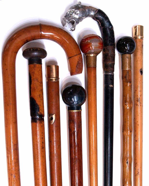 COLLECTION WALKING CANES, 800 SILVER PANTHER: (lot of 8) Collection of antique and vintage walking sticks, including a very fine 800 silver mounted stick in the form of a panther with glass eyes, leather, button reading 'Alvarez.....Madrid', (2) 