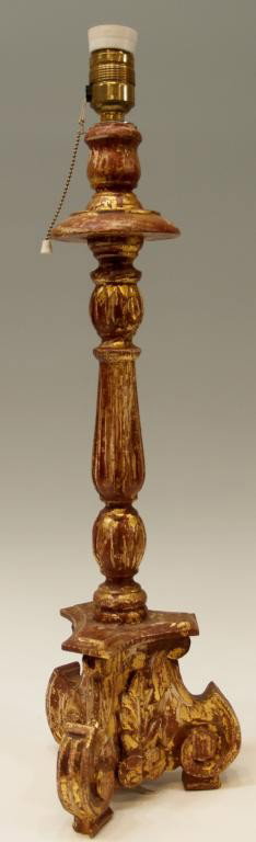 SPANISH CARVED GILDED WOOD CANDLE STAND TABLE LAMP: Spanish gilt wood candle lamp rising on a tripodal base, electrified but in need of wiring, overall: 25.25"h, 1.25lbs Start Price: $100.00
