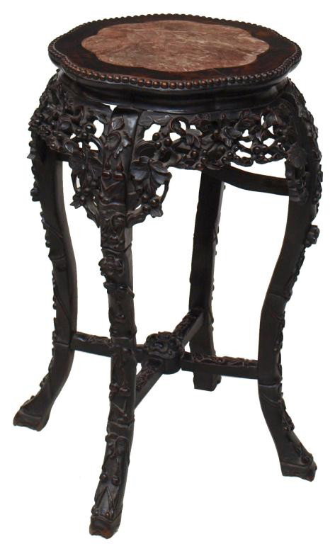 ANTIQUE, ORNATE CHINESE OCCASIONAL TABLE, MARBLE: Ornate Chinese occasional table, c. 1900, having inset marble top, foliate carving on apron legs, stretcher, set on stylized hoof feet, 28.5"h, 19"d Start Price: $300.00