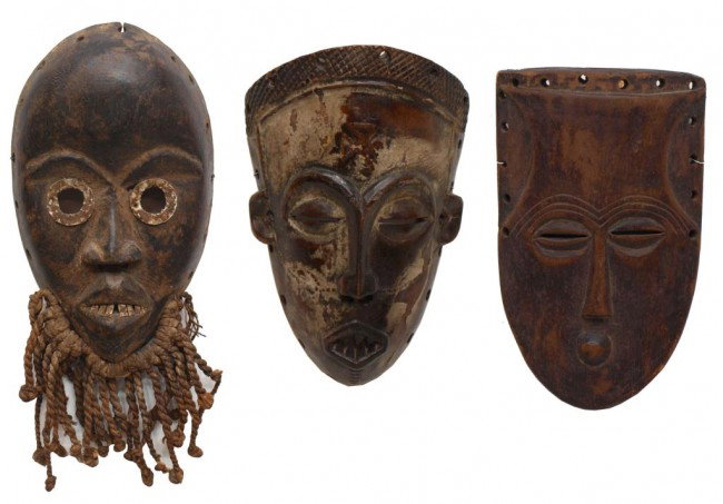 (3) ANTIQUE HANDCARVED WOOD AFRICAN MASKS: (lot of 3) African carved wood tribal masks: (1) Dan tribe, Liberia, metal eyes and teeth, tied rope beard, 13.5"h, 6"w, 2"d; (1) Chokwe, Republic of Angola, checkered carving at top, slit eyes, mouth