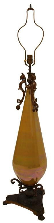 AMPHORA FORM OPALESCENT TABLE LAMP: Large vintage opalescent table lamp, mid 20th c., the top with three winged griffins, the whole set on flat triangular base with claw feet, 50.5"h, 13"w, 11"d, 16lbs Start Price: $80.00