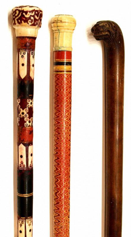 (3) WALKING STICKS, IVORY, ANIMAL HEAD, BONE INLAY: **International shipping is not available for this item. This item will only be shipped within the United States.** (lot of 3) Walking canes: (1) having a carved circular ivory handle over painted zig