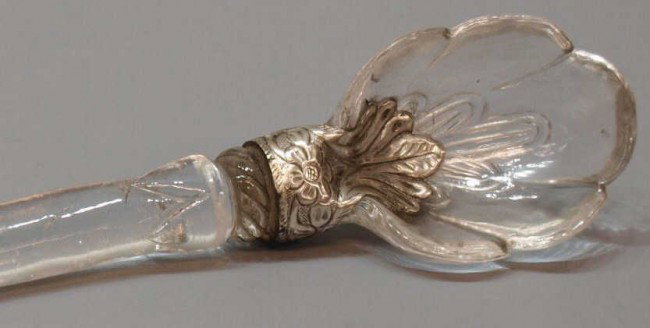 RARE MUGHAL ROCK CRYSTAL & SILVER SPOON: Rare Mughal rock crystal spoon, 18th c., a silver fitting joining the shaped bowl to curved handle terminating in a whorl, 7"l, .25lb **Note: a similar example in the Khalili collection** *Provenance: