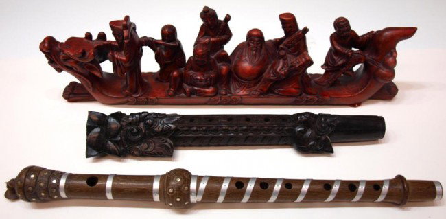 ASIAN CARVED WOOD DRAGON BOAT & INSTRUMENTS: (lot of 3) Southeast Asian wood carvings including (2) musical instruments and (1) dragon boat carved with the eight immortals, 18"l, 3lbs total Start Price: $50.00