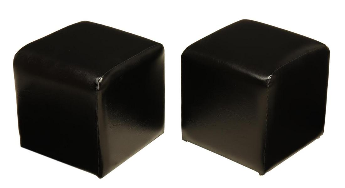 (2) FRENCH MODERN BLACK FAUX LEATHER FOOTSTOOLS: (pair) French modern footstools/ ottomans, c. 1970s, minimalist design, in black faux leather upholstery, on small glider feet, approx 13.75"h, 13"w, 13"d Start Price: $80.00