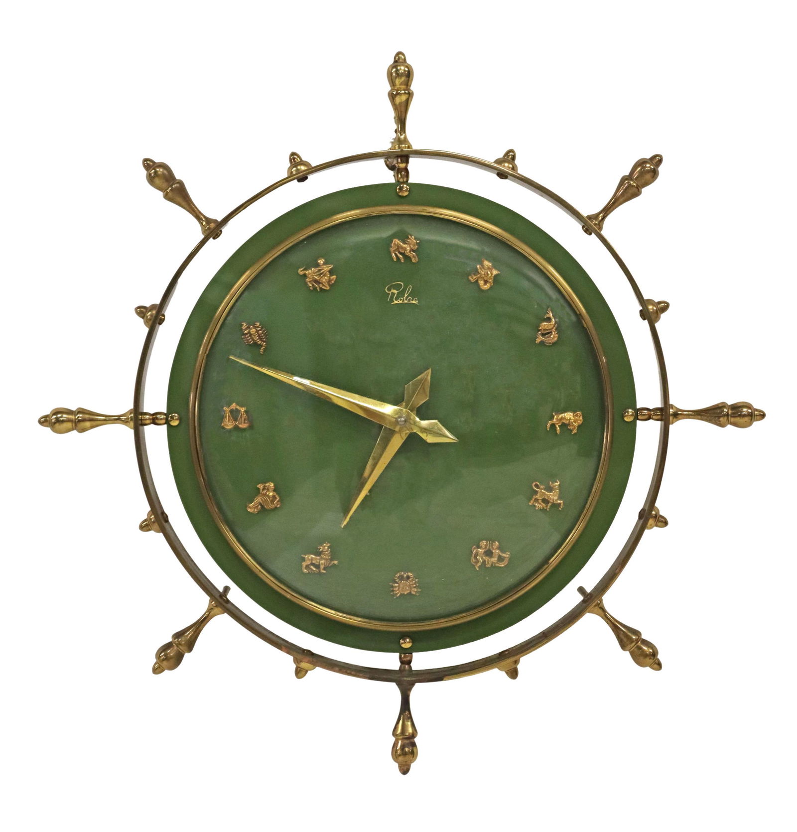 MID-CENTURY MODERN ZODIAC SHIP'S WHEEL WALL CLOCK: Mid-century modern ship's wheel wall clock, c.1960s, green plastic dial, hour markers representing the astrological zodiac signs, Swiss battery-operated movement, approx 18"diam, 6.75lbs Start Price: