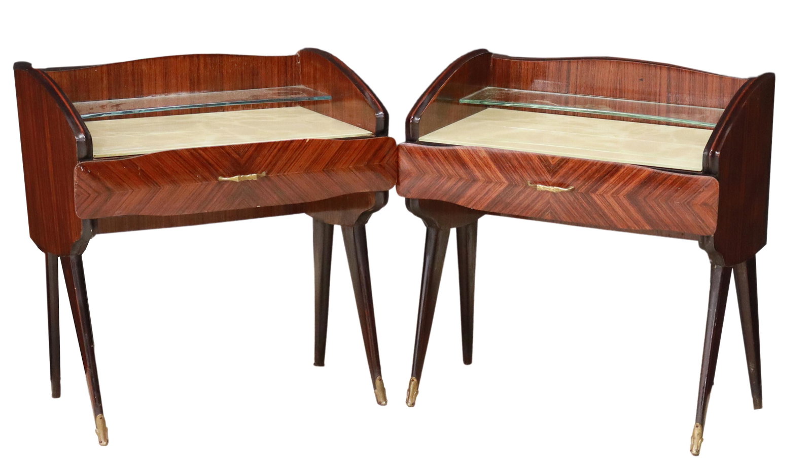(2) ITALIAN MID-CENTURY MODERN NIGHTSTANDS: (pair) Italian mid-century modern rosewood nightstands, c.1950s, shaped clear glass shelf, over inset glass top, fitted with single drawer, rising on tapered legs, approx 22.25"h, 21"w, 14"d Start Pri