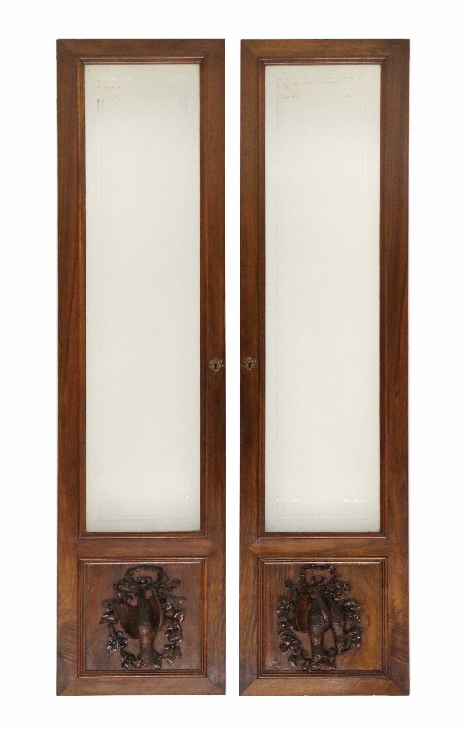 (2) CONTINENTAL ARCHITECTURAL CARVED DOORS: (pair) Continental paneled doors, with frosted fleur de lis glazed panels, over protruding carved game fowl and ribbon ornamentation, approx 65.5"h, 16.25"w, 30lbs total Start Price: $100.00