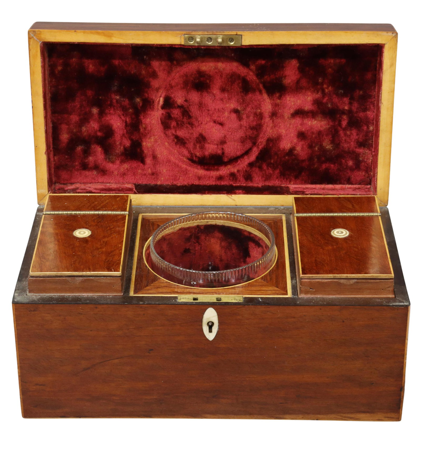 ENGLISH REGENCY MAHOGANY FITTED TEA CADDY: English Regency mahogany tea caddy, 19th c., hinged lid opening to velvet lined interior, two removable compartments with string inlay, centering well with cut glass goblet, approx 6"h, 12"w, 6"d, 5lb
